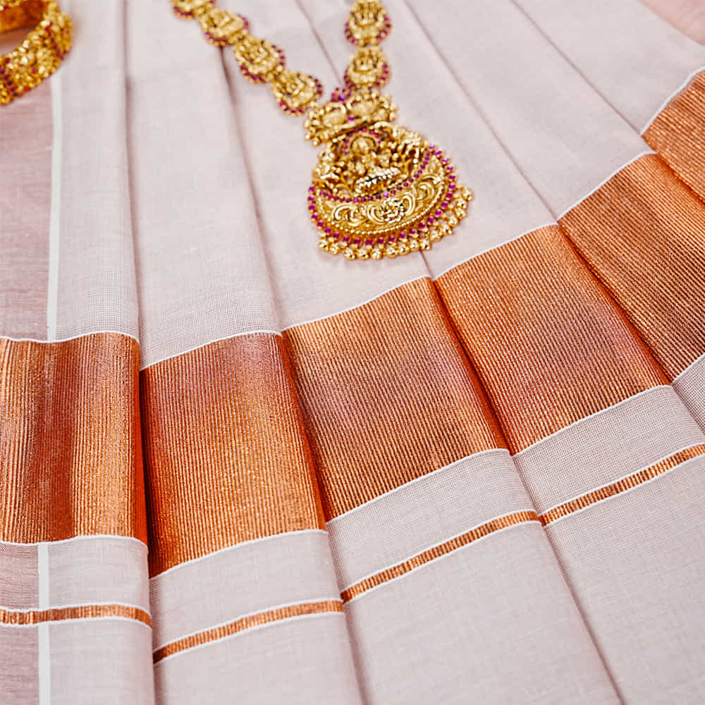 Golden zari kerala cotton saree – www.vannamayil.com