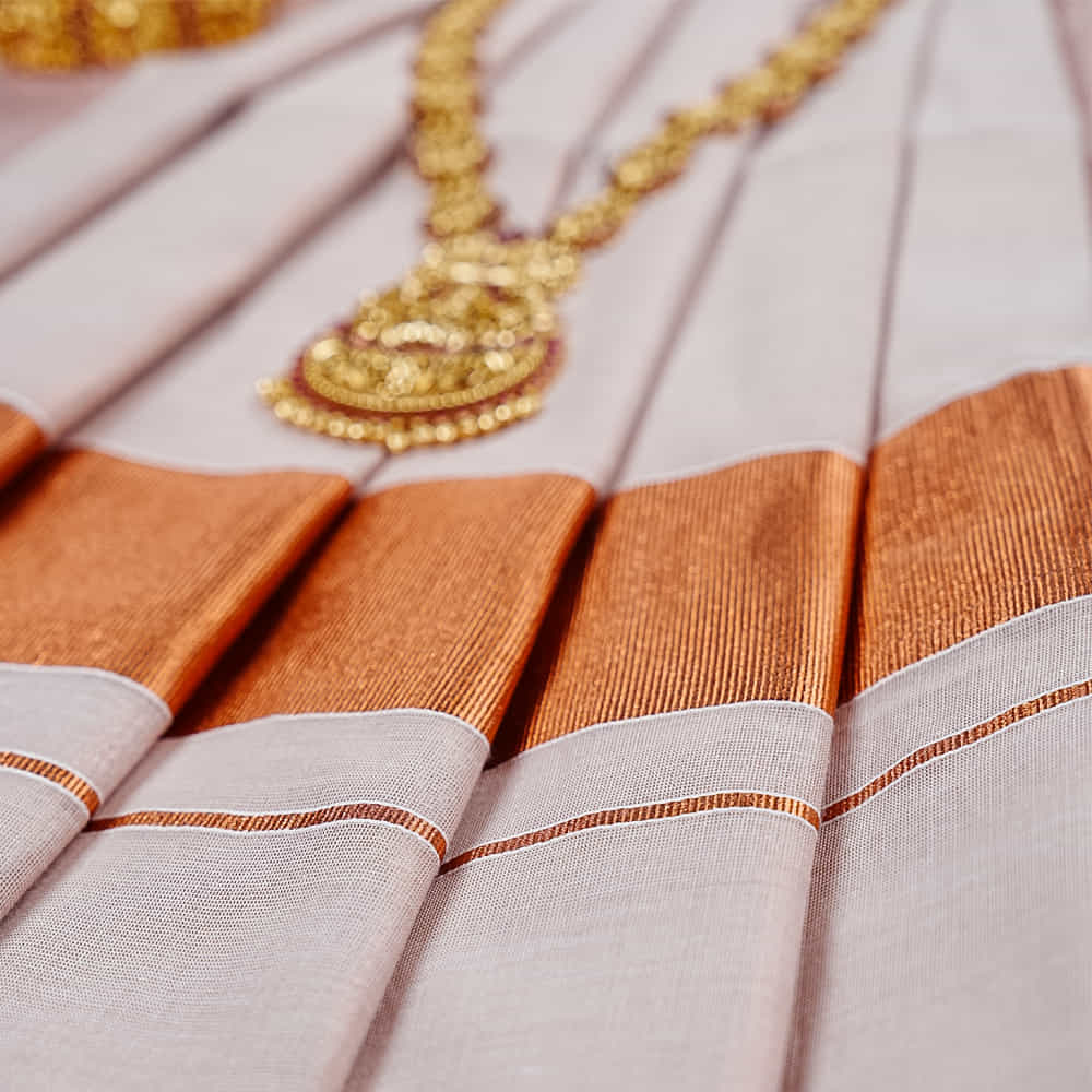 Buy Ekatva Kerala Tissue Saree With Copper Border