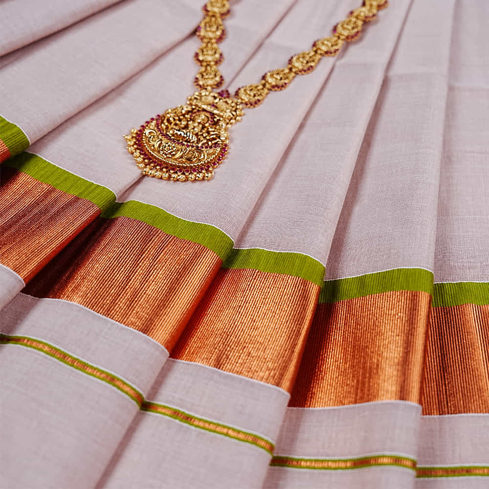Copper Tissue Kerala Saree with 3 Inch Copper and Light Green Zari Border